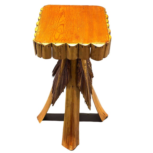 Mid-Century era split side table drink stand featuring a bent rattan structure with a Koa Wood tabletop.This unique accent...