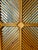 A striking 1977 Chapman Manufacturing Company three-panel folding screen, showcasing the distinctive craftsmanship and...