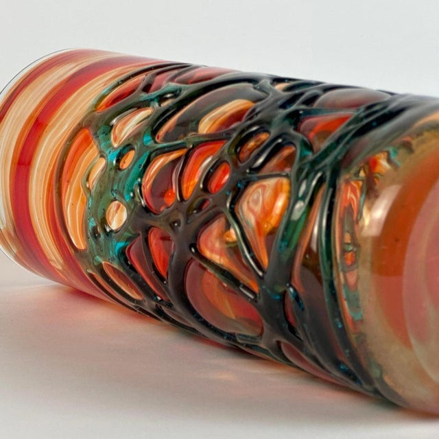 An evocative example of 1980s art glass, this cylindrical vase was produced by Mdina Glass in Malta under the direction of...