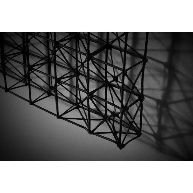 Geometric three-dimensional metal wall mounted sculpture, France 1960s. The sculpture shows open modular cubes and primary...