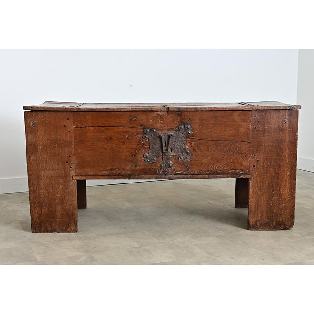 An enormous German coffer-trunk from the 16th century (possibly the oldest antique in our entire 18,000 sqft. showroom!),...
