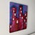 Vintage 1996 signed postmodern cityscape oil painting in lovely pink, red, purple, blues, white and black tones. The piece...