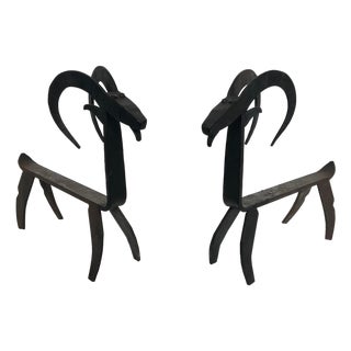 1950s Pair of wrought iron andirons representing a goat in the style of Edouard Schenck For Sale