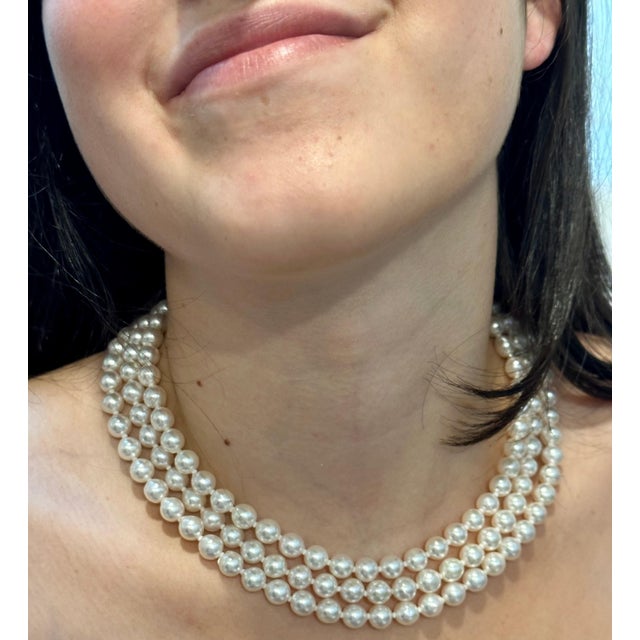 Introducing the 8mm Akoya Japan Pearl Triple Strand choker Necklace, complete with a 18 Karat white Gold clasp with...
