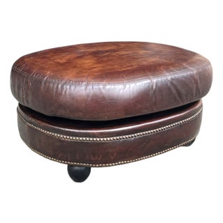 Vintage Oval Brown Leather Ottoman With Brass Nailhead Trim and Rounded Feet For Sale