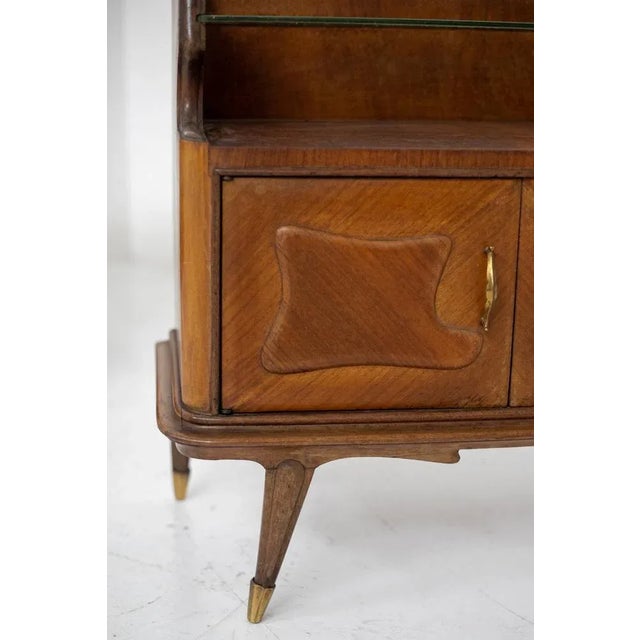 Beautiful pair of bedside tables in fine Italian-made wood dating from the 1950s. The nightstands are made of a beautiful...