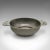 This is a small antique salter. An English, Tudric pewter dish from Liberty of London by Archibald Knox, dating to the...
