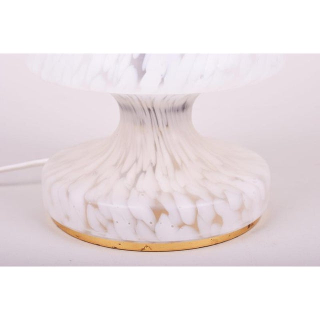 This charming table lamp comes from Czechoslovak production of the 1960s. Its safety and technical quality are attested by...