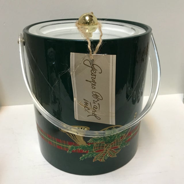 Here we have a Vintage Christmas Georges Briard ice bucket with stainless steel ice tongs (tongs are not shown in photos)...