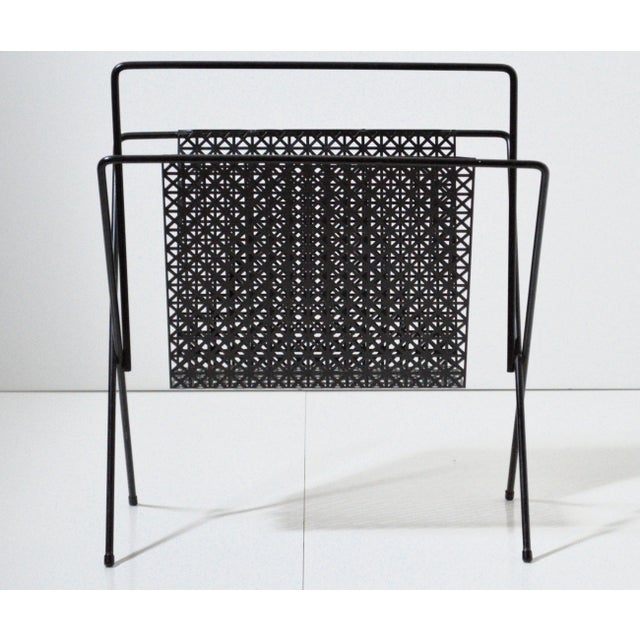 MCM Atomic Black Metal Pierced Sunburst Magazine Rack Holder. It's used in good condition with normal signs of wear,...