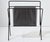 MCM Atomic Black Metal Pierced Sunburst Magazine Rack Holder. It's used in good condition with normal signs of wear,...