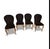 Striking set of four slipper chairs blending classic Hollywood Regency form with bold postmodern flair. Each chair...