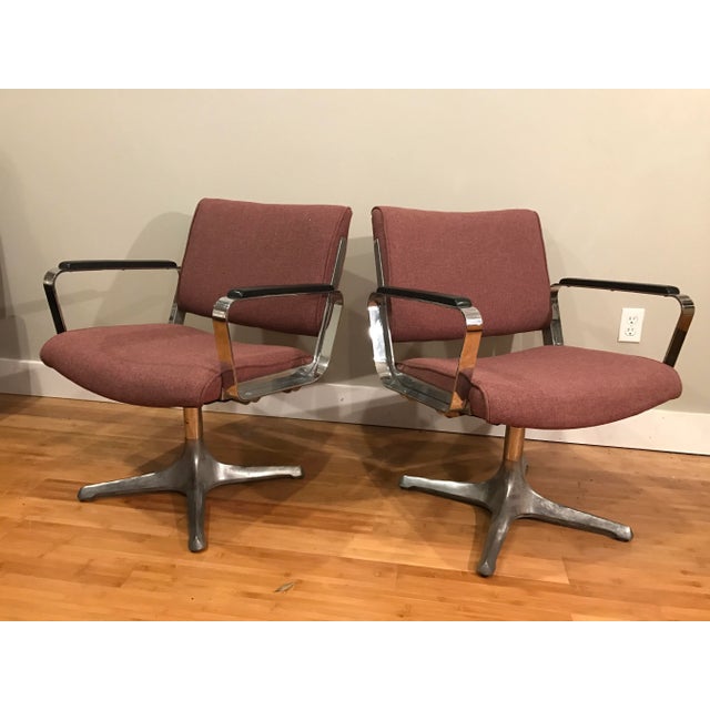 Pair of super solid chrome chairs. Similar to Eames aluminum group or management but no markings. Thick, heavy chrome arms...