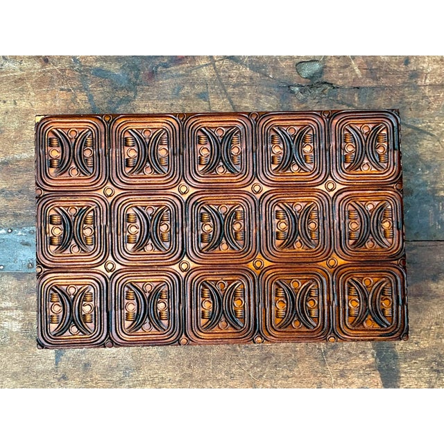 This vintage carved wood box is a masterclass in Brutalist-inspired relief work, offering a sophisticated blend of...