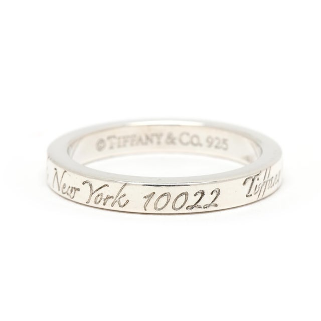 Ring Size 5.75 Rise Off Of Finger: 2 mm Width: 2.8 mm Weight: 1.9 dwts. / 3 grams Stamps: "Tiffany & Co 925" w/ pouch *New...