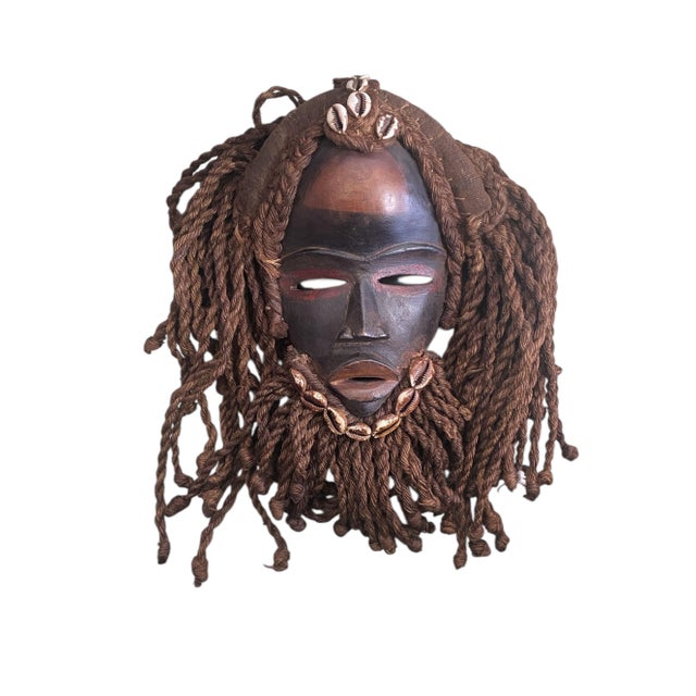 This exceptional piece of African art is a ceremonial dance mask from the Dan people of the Ivory Coast, including their...