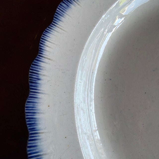 A Very Nice Antique Blue Feather-Edge Pearlware Plate, Circa 1810 Made in Staffordshire, England An unusual deep-form...