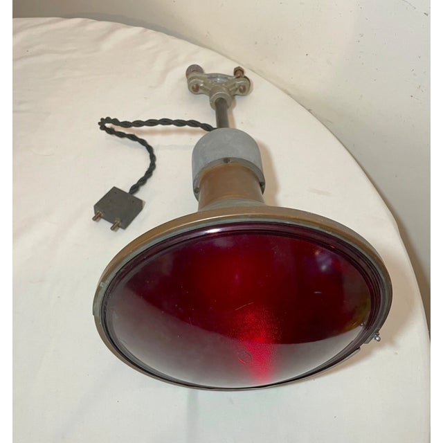 Up for sale is a large antique flood lamp made by Major Equipment Co. in Chicago around 1920. It is a very rare fixture...