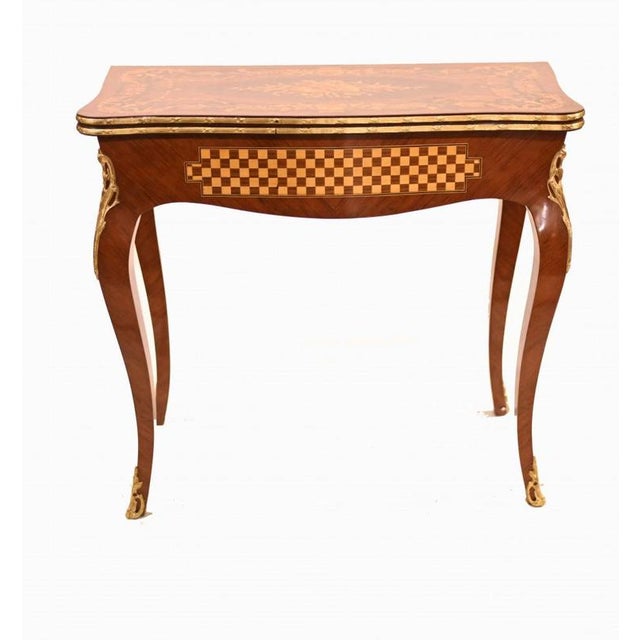 Gorgeous Louis XVI revival games table in kingwood Features intricate marquetry inlay work on all surfaces including...