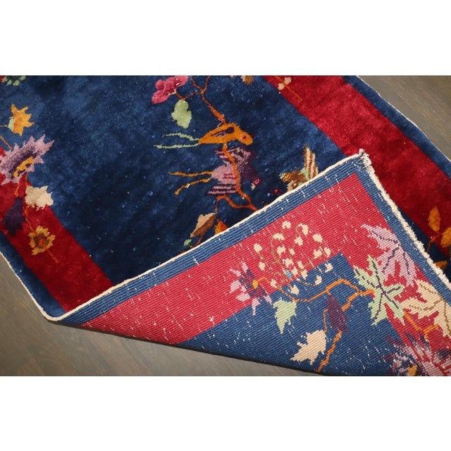 A signed art deco small rug from the 1940s. signature found on the bottom corner of a border Details rug no. j4510 size 2'...
