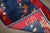 A signed art deco small rug from the 1940s. signature found on the bottom corner of a border Details rug no. j4510 size 2'...