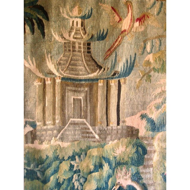 This lovely Aubusson piece is in the Chinoiserie style showing on idyllic landscape of what rient should look like with a...