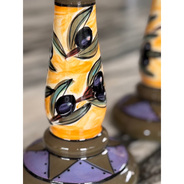 Here is a one-of-a-kind pair of hand-made Italian candle holders sure to set your table or buffet apart from the rest. No...