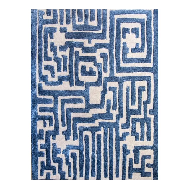Walk the maze with the Theseus geometric rug design, named after the mythical Prince of Athens who walks King Midas' maze...