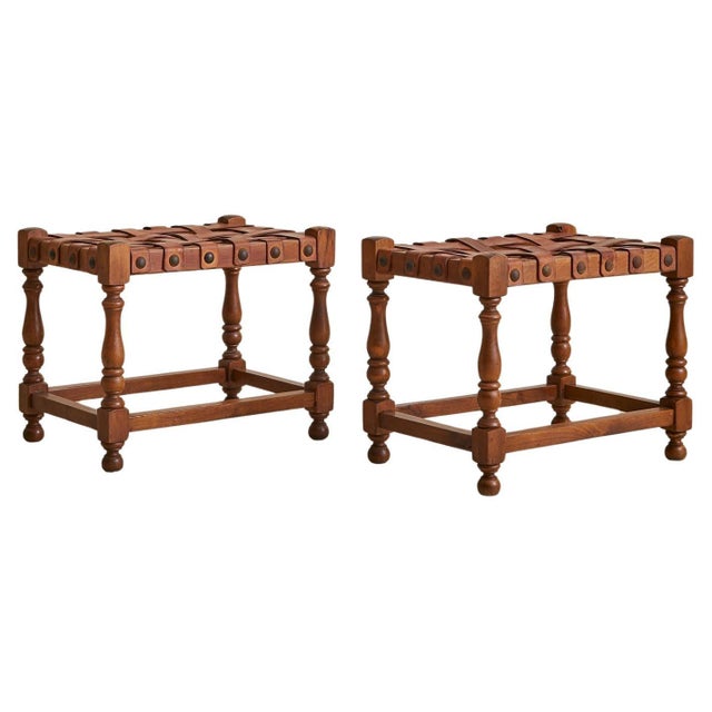 Sold and priced individually. A 1950s Spanish stool, crafted in solid oak with a rich, warm patina. The seat is composed...