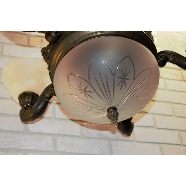 Metal Antique Neoclassical Figural Bronze Northwind Faced Chandelier For Sale - Image 7 of 8