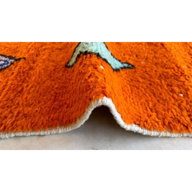 The contemporary design of the Boujaad rug showcases abstract patterns that evoke a sense of modern sophistication. The...