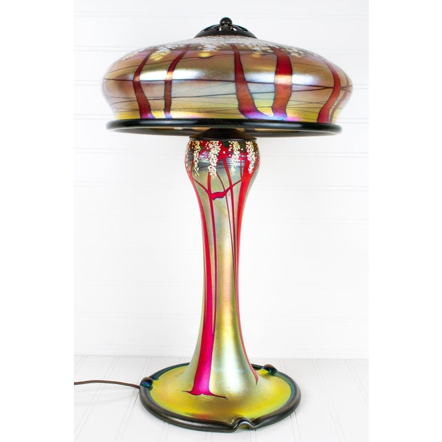This beautiful and graceful Luster Art Glass large table lamp with a Cherry Blossom design is hand blown by renowned glass...