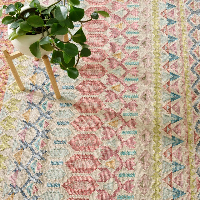 Loom knotted cotton flatweave rug features unique and pretty Fairisle motifs woven in a Birdseye technique, which...
