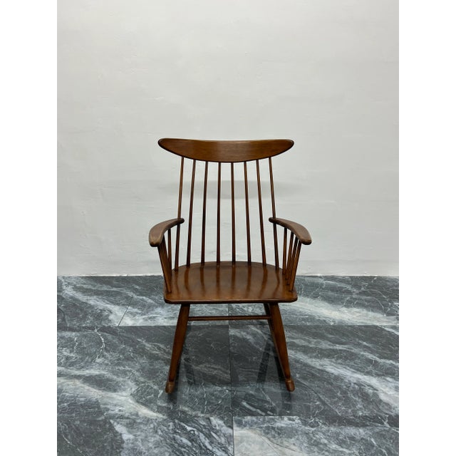 Spindle back maple wood rocker designed by Russel Wright and manufactured by Conant Ball.