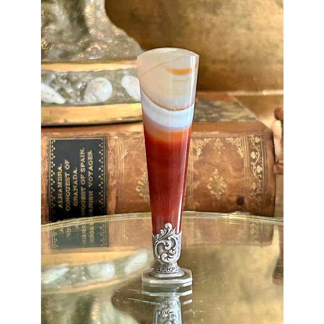 An elegant French desk seal featuring a beautifully polished banded agate handle with striking layers of cream, honey, and...