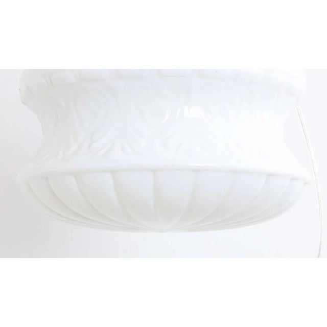 Opaline Glass Schoolhouse Light, a timeless and classic lighting fixture inspired by the iconic design of vintage...