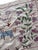Hand-embroidered Suzani panel from Uzbekistan, worked in fine floss on a cream cotton ground. Two winged horses and two...