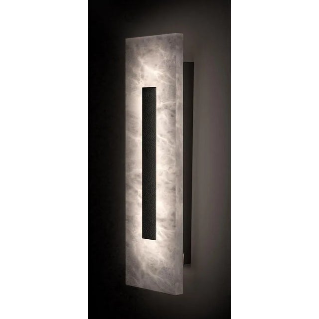 Himeji small shiny black applique by alabastro italiano dimensions: ø 15 x h 50 cm. Materials: white alabaster, leather...