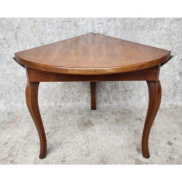 Vintage Lane Furniture accent table, circa 1960s. featuring triangular form with drop leaf design, book match top and...