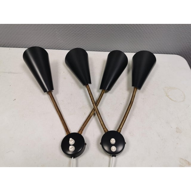 Two wall lamps with brass arms, Danish, from the 1960s-70s. They have been refurbished and given a new charcoal gray...