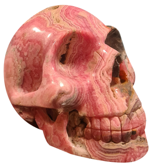 Skull in Rhodochrosite Mineral