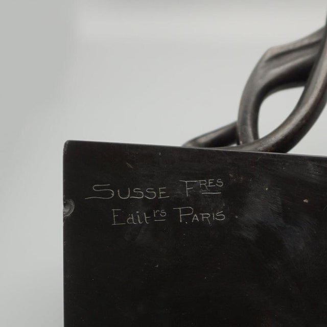 Panthère en marche, an art deco patinated bronze sculpture of a stylised panther prowling over an angled slate base. A few...