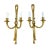Amazing matching pair of gilt bronze sconces in the shape of knotted ribbons holding two candle arms. These amazing set...
