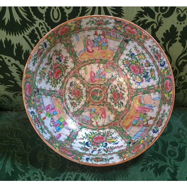 This lovely large size Chinese Export Rose Medallion punch bowl was hand painted in the first half of the 19th century...