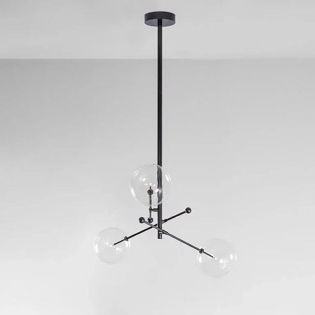 Black gunmetal 3 arm chandelier by schwung dimensions: w 97.8 x d 97.8 x h 143 cm materials: solid brass, hand blown glass...