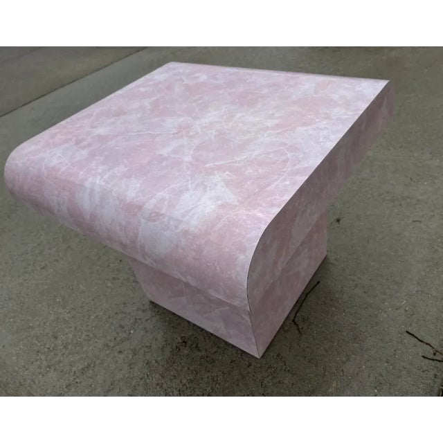 Faux marble pink laminate end table custom made in 1980. I have the same matching coffee table in the shop. Feel free to...