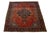 This beautiful antique Persian Farahan hand-knotted wool rug dates back to the 1880s. Its red-rust field features classic...
