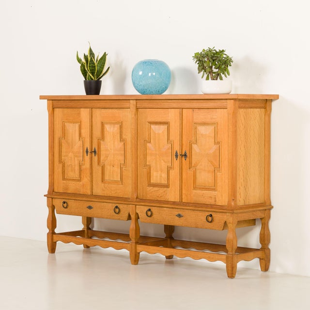The striking scandinavian highboard by henning kjaernulf, designed for eg møbler, comes from the 1970s. overall size is h:...