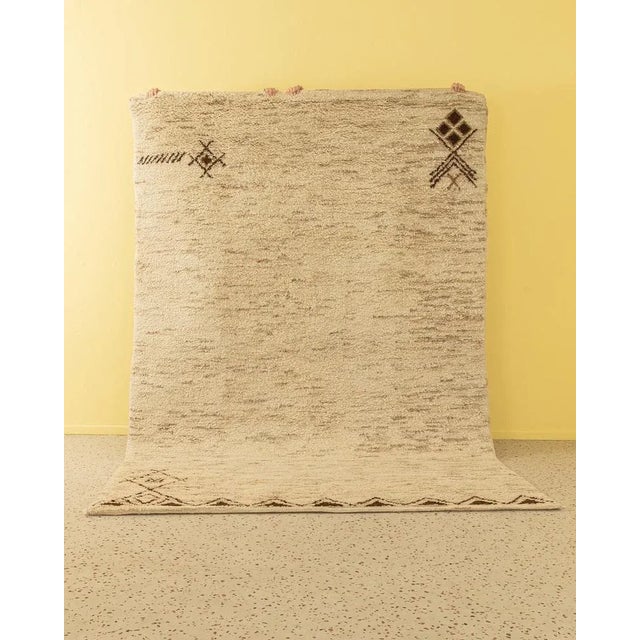 High quality Berber carpet from the 1960s. Wonderful thick pile in creamy white and beige tones with patterns in earth...