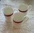 Lauren Ralph Lauren Normandy Crimson Mugs - Discotinued. 4" tall / 3" diameter / 12 oz. White with crimson ribbed band and...